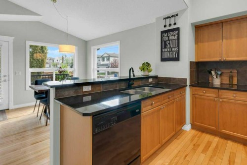 36 Rockyspring Rise Nw, Calgary, AB - Indoor Photo Showing Kitchen With Double Sink