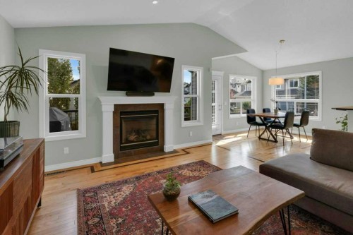 36 Rockyspring Rise Nw, Calgary, AB - Indoor Photo Showing Living Room With Fireplace