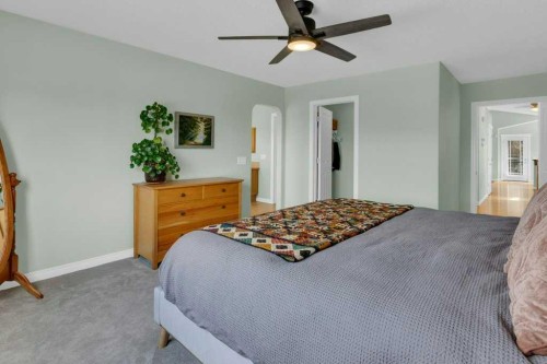 36 Rockyspring Rise Nw, Calgary, AB - Indoor Photo Showing Bedroom
