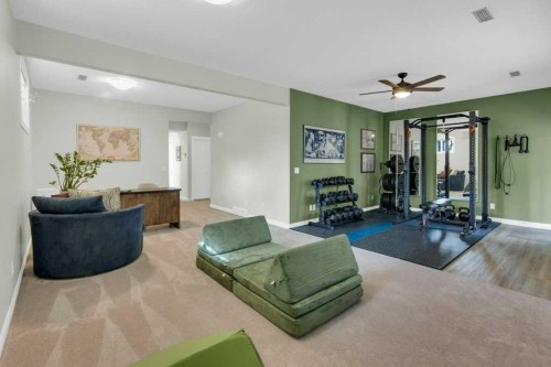 36 Rockyspring Rise Nw, Calgary, AB - Indoor Photo Showing Gym Room