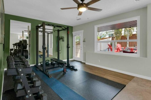 36 Rockyspring Rise Nw, Calgary, AB - Indoor Photo Showing Gym Room