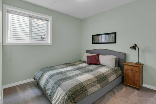 36 Rockyspring Rise Nw, Calgary, AB - Indoor Photo Showing Bedroom