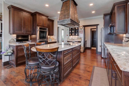 31 Montenaro Bay, Cochrane Lake, AB - Indoor Photo Showing Kitchen