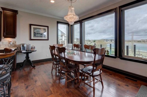 31 Montenaro Bay, Cochrane Lake, AB - Indoor Photo Showing Dining Room