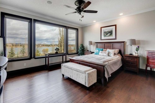 31 Montenaro Bay, Cochrane Lake, AB - Indoor Photo Showing Bedroom