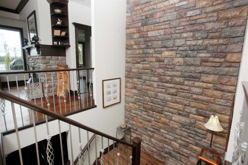 31 Montenaro Bay, Cochrane Lake, AB - Indoor Photo Showing Other Room
