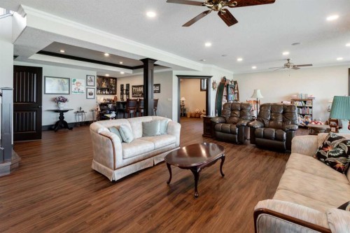31 Montenaro Bay, Cochrane Lake, AB - Indoor Photo Showing Living Room