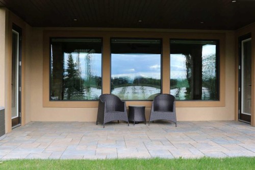 31 Montenaro Bay, Cochrane Lake, AB - Outdoor With Deck Patio Veranda With Exterior