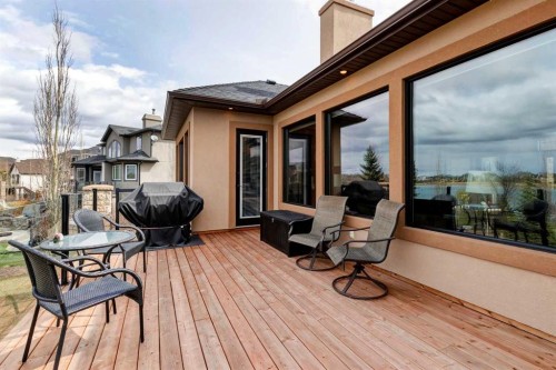 31 Montenaro Bay, Cochrane Lake, AB - Outdoor With Deck Patio Veranda With Exterior