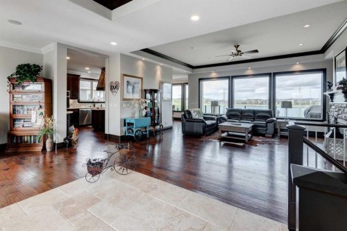31 Montenaro Bay, Cochrane Lake, AB - Indoor Photo Showing Living Room