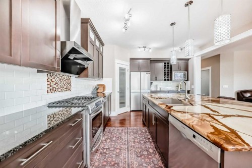 75 Silverado Bank Gardens Sw, Calgary, AB - Indoor Photo Showing Kitchen With Upgraded Kitchen