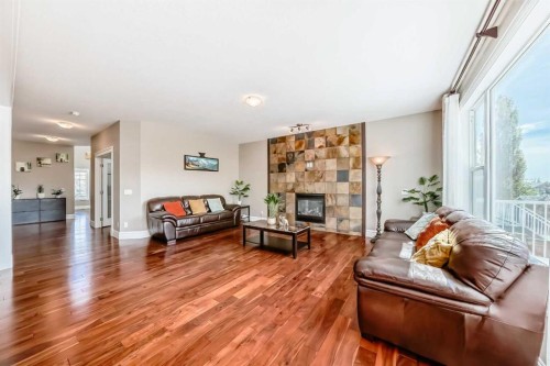 75 Silverado Bank Gardens Sw, Calgary, AB - Indoor Photo Showing Living Room With Fireplace