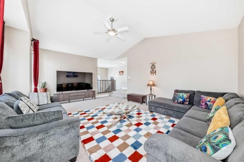 75 Silverado Bank Gardens Sw, Calgary, AB - Indoor Photo Showing Living Room