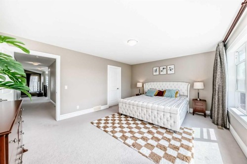 75 Silverado Bank Gardens Sw, Calgary, AB - Indoor Photo Showing Bedroom
