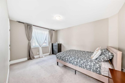 75 Silverado Bank Gardens Sw, Calgary, AB - Indoor Photo Showing Bedroom