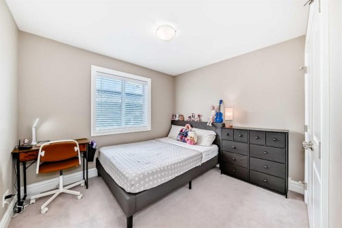 75 Silverado Bank Gardens Sw, Calgary, AB - Indoor Photo Showing Bedroom
