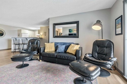 2307-12 Cimarron Common, Okotoks, AB - Indoor Photo Showing Living Room