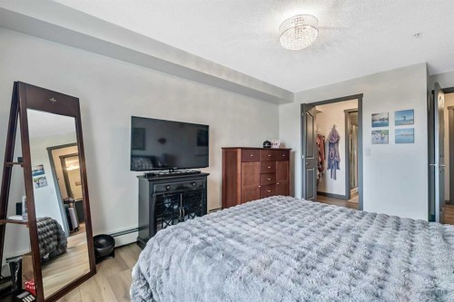 2307-12 Cimarron Common, Okotoks, AB - Indoor Photo Showing Bedroom