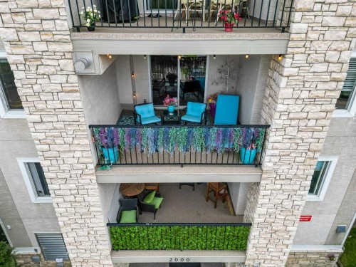 2307-12 Cimarron Common, Okotoks, AB - Outdoor With Balcony With Exterior