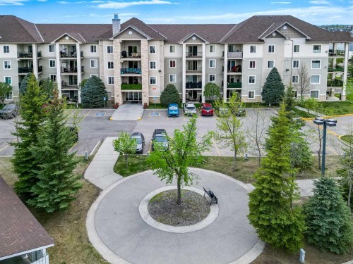 2307-12 Cimarron Common, Okotoks, AB - Outdoor With Balcony With Facade