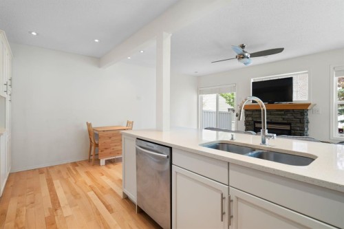 10 Eversyde Court Sw, Calgary, AB - Indoor Photo Showing Kitchen With Double Sink