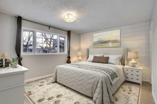 64 Hartford Road Nw, Calgary, AB - Indoor Photo Showing Bedroom