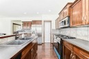 55 Eversyde Gardens Sw, Calgary, AB  - Indoor Photo Showing Kitchen With Stainless Steel Kitchen With Double Sink With Upgraded Kitchen 
