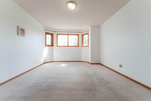 117 Evergreen Place Sw, Calgary, AB - Indoor Photo Showing Other Room