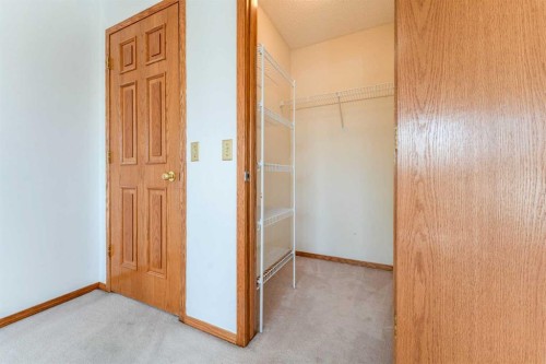 117 Evergreen Place Sw, Calgary, AB - Indoor Photo Showing Other Room