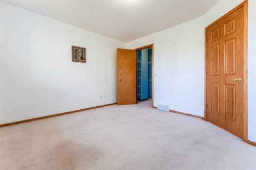 117 Evergreen Place Sw, Calgary, AB - Indoor Photo Showing Other Room