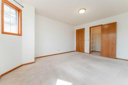 117 Evergreen Place Sw, Calgary, AB - Indoor Photo Showing Other Room