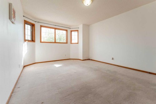 117 Evergreen Place Sw, Calgary, AB - Indoor Photo Showing Other Room