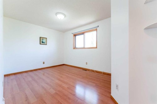 117 Evergreen Place Sw, Calgary, AB - Indoor Photo Showing Other Room