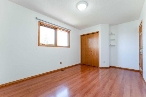 117 Evergreen Place Sw, Calgary, AB - Indoor Photo Showing Other Room