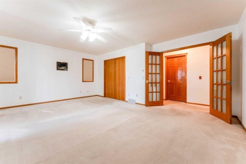 117 Evergreen Place Sw, Calgary, AB - Indoor Photo Showing Other Room