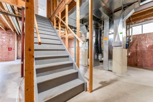 117 Evergreen Place Sw, Calgary, AB - Indoor Photo Showing Basement