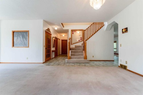 117 Evergreen Place Sw, Calgary, AB - Indoor Photo Showing Other Room