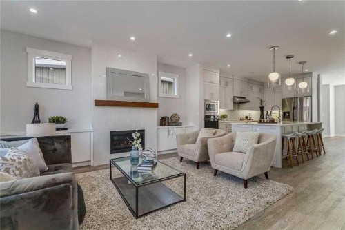 3122 39 Street Sw, Calgary, AB - Indoor Photo Showing Living Room With Fireplace