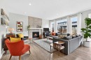 95 Howse Road Ne, Calgary, AB  - Indoor Photo Showing Living Room With Fireplace 