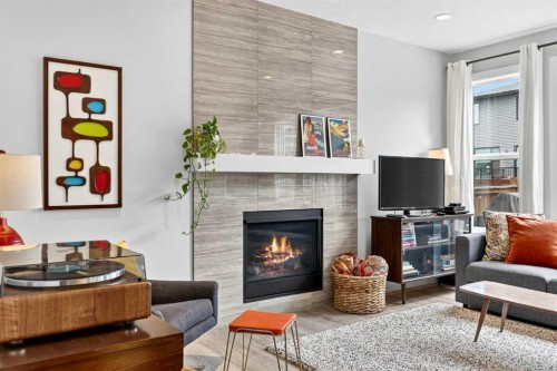 95 Howse Road Ne, Calgary, AB - Indoor Photo Showing Living Room With Fireplace