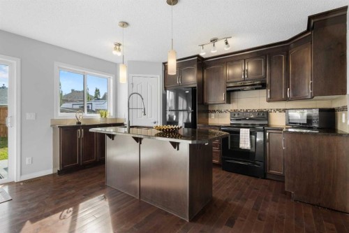 49 Auburn Crest Lane Se, Calgary, AB - Indoor Photo Showing Kitchen With Upgraded Kitchen