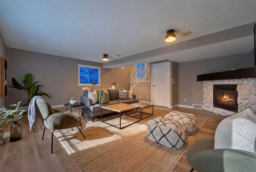 160 Citadel Bluff Close Nw, Calgary, AB - Indoor Photo Showing Living Room With Fireplace