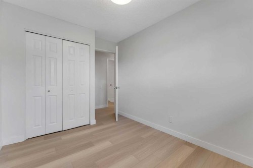 214 Rundleview Close Ne, Calgary, AB - Indoor Photo Showing Other Room