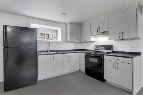 214 Rundleview Close Ne, Calgary, AB - Indoor Photo Showing Kitchen
