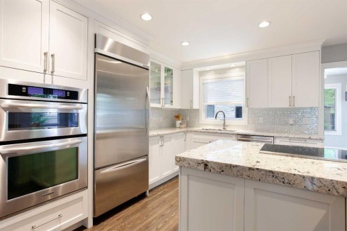 51 Wimbledon Drive Sw, Calgary, AB - Indoor Photo Showing Kitchen With Upgraded Kitchen