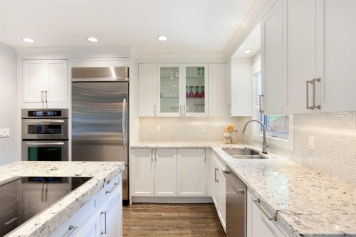 51 Wimbledon Drive Sw, Calgary, AB - Indoor Photo Showing Kitchen With Double Sink With Upgraded Kitchen