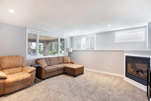 51 Wimbledon Drive Sw, Calgary, AB - Indoor With Fireplace