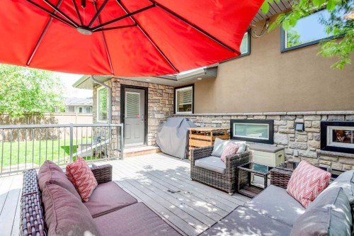 51 Wimbledon Drive Sw, Calgary, AB - Outdoor With Fireplace With Deck Patio Veranda With Exterior