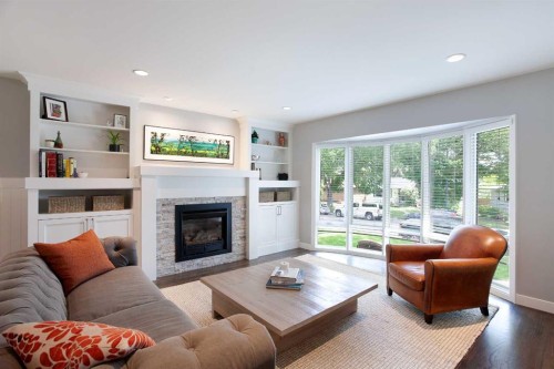 51 Wimbledon Drive Sw, Calgary, AB - Indoor Photo Showing Living Room With Fireplace