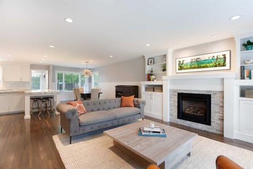 51 Wimbledon Drive Sw, Calgary, AB - Indoor Photo Showing Living Room With Fireplace